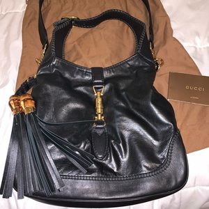 Gucci black leather Jackie O w/ tassels and strap